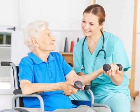 Occupational therapist working with patient