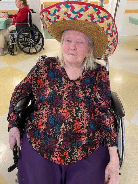 Happy resident in sombrero for Cinco de Mayo