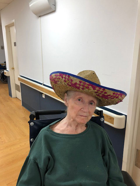 San Simeon female resident wearing sombrero on Cinco de Mayo