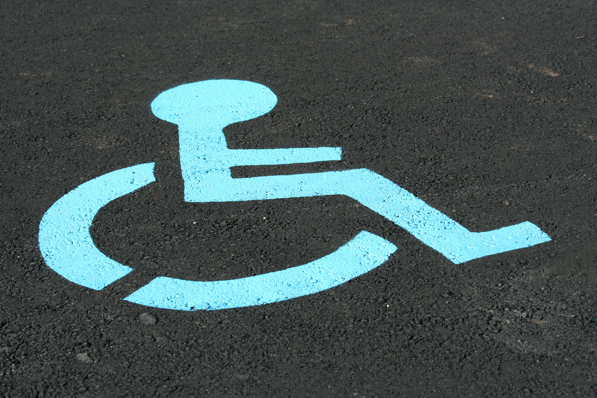 handicapped symbol in parking lot