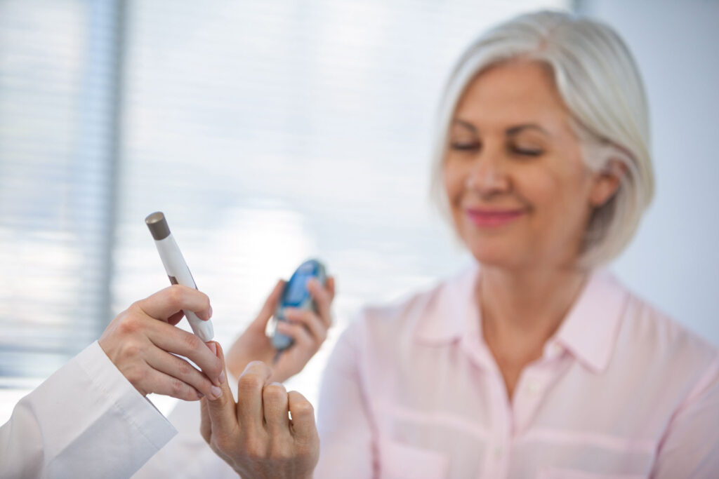 Woman getting a glucose test