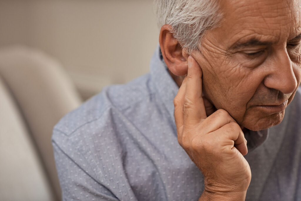 senior male experiencing hearing loss