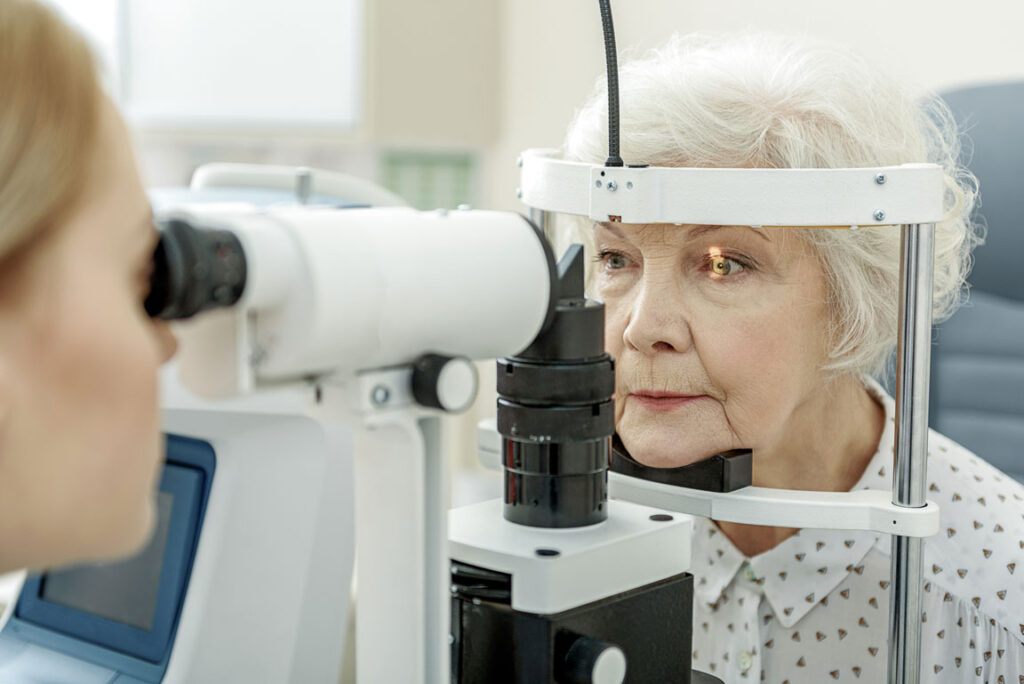 senior female having an eye exam