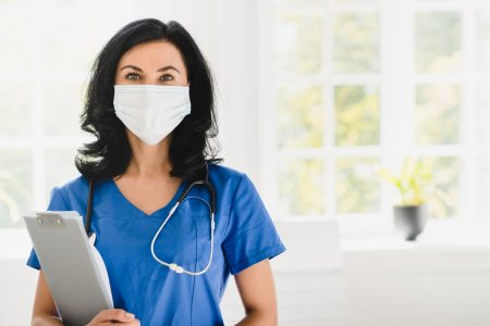 caregiver wearing protective face mask