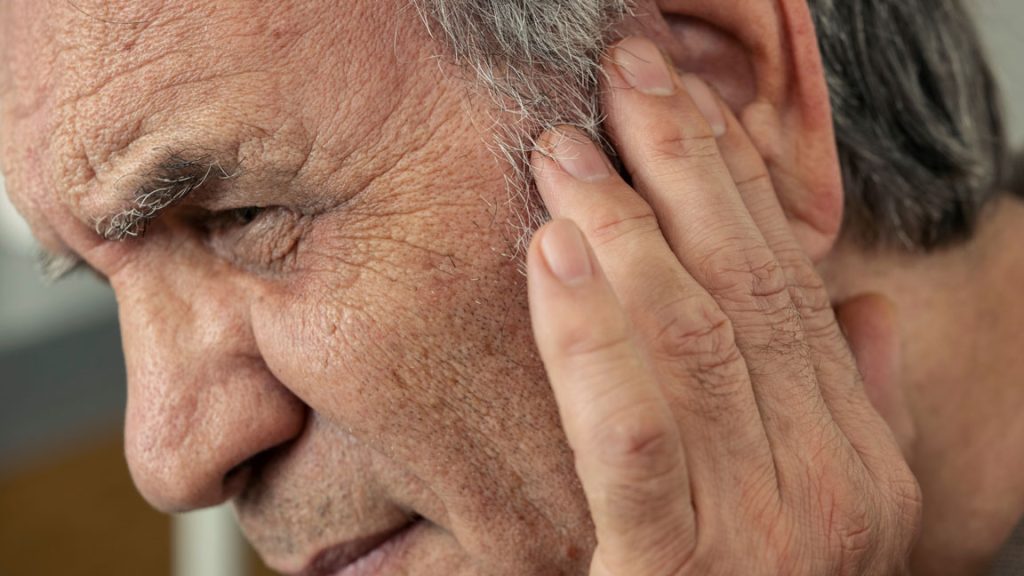 senior male with hearing loss
