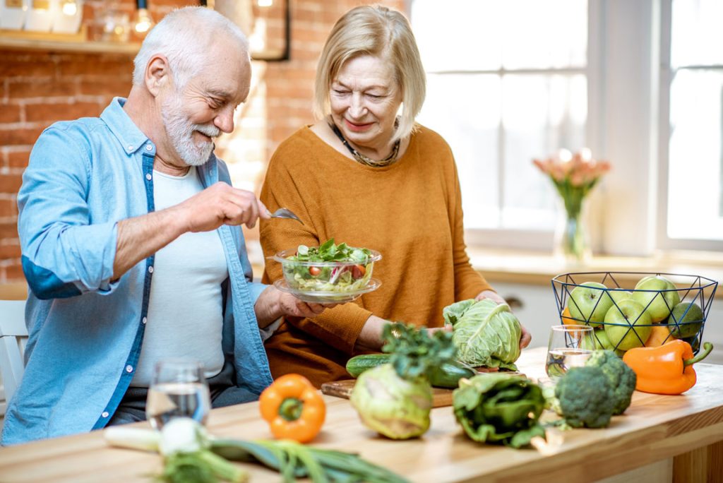 senior couple eating healthy food