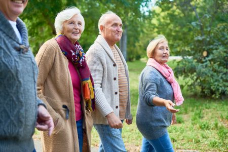 Friends Walking in Park