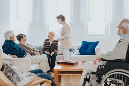 Nurse with patients at a care facility